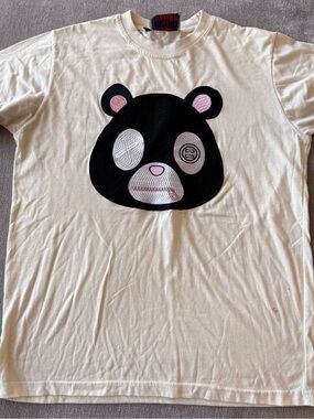 Retro Label Bear Patch Men’s Graphic Tee in Cream with Black & Pink Accent (XL)